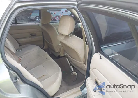 2003 Ford Crown Victoria Standard z USA, uszkodzony, nr VIN 2FAFP73W63X161494